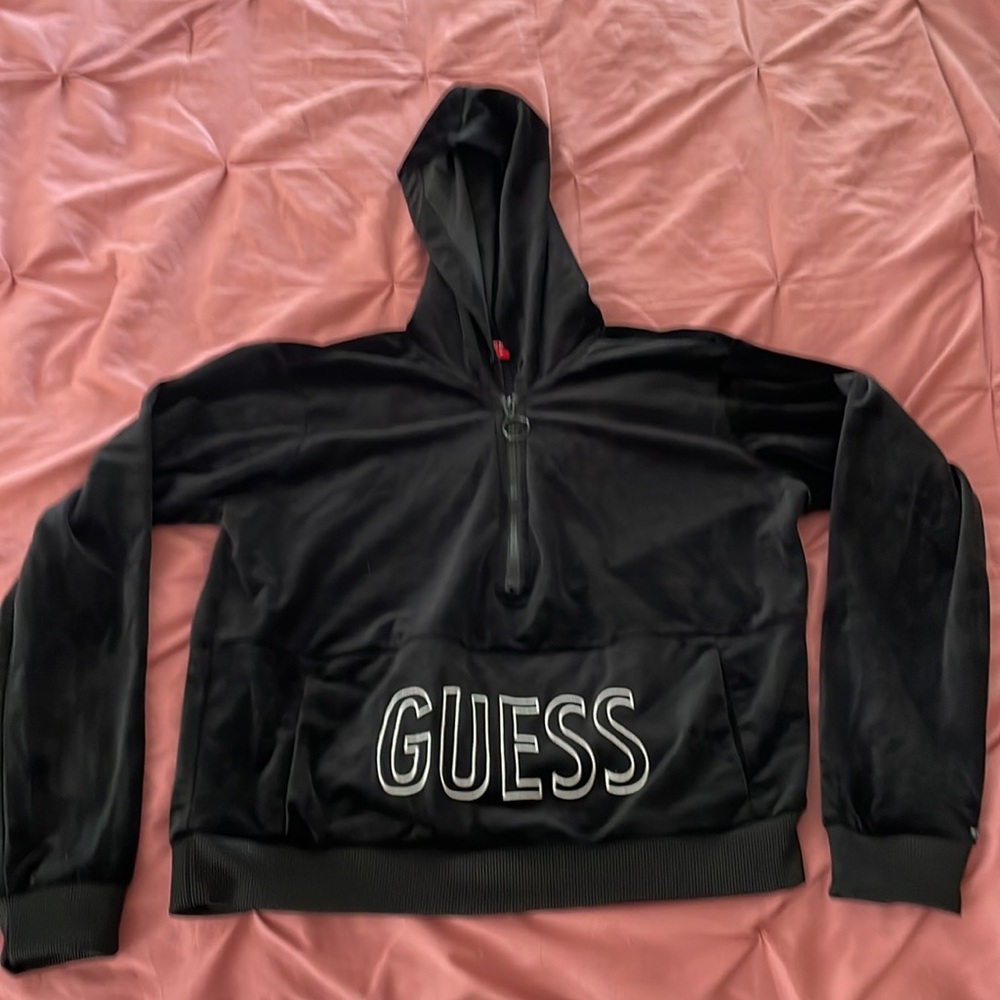 Guess hooded sweatshirt. Labeled a size Medium